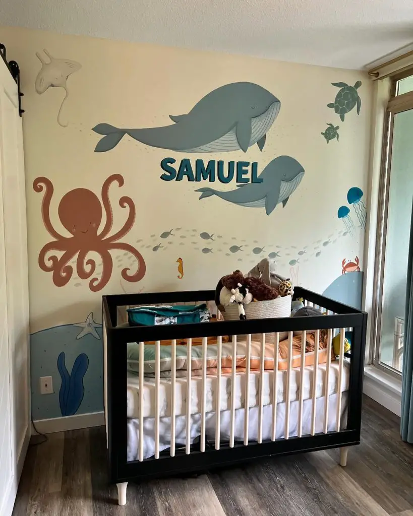 Personalized ocean nursery with whales and sea creatures