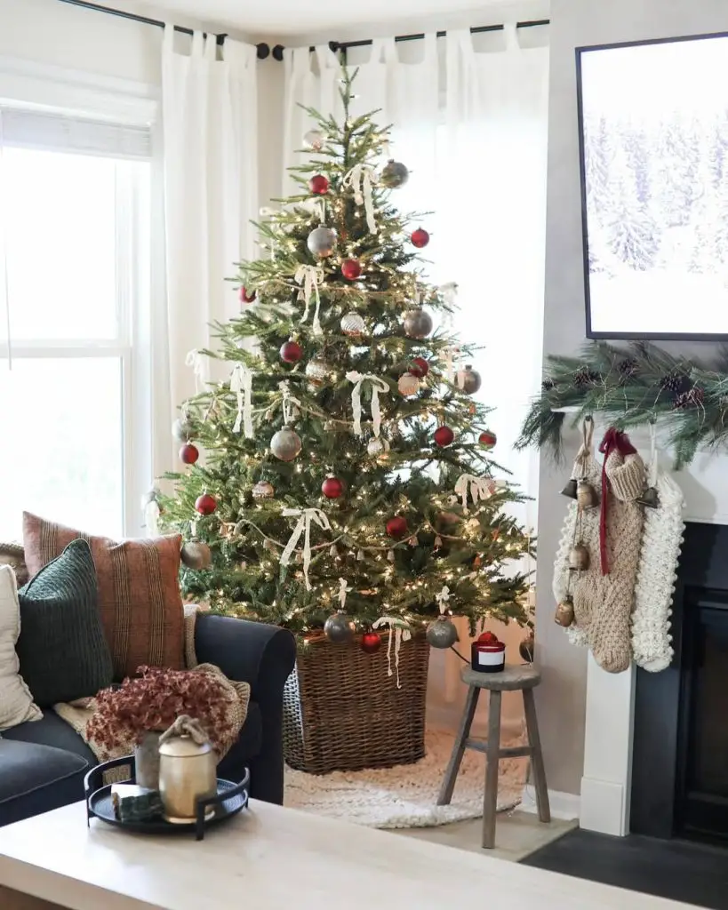Living room corner with Christmas tree and fireplace