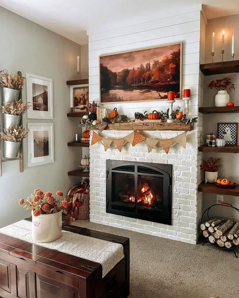 Fall fireplace mantel with pumpkins candles autumn colors and cozy decor
