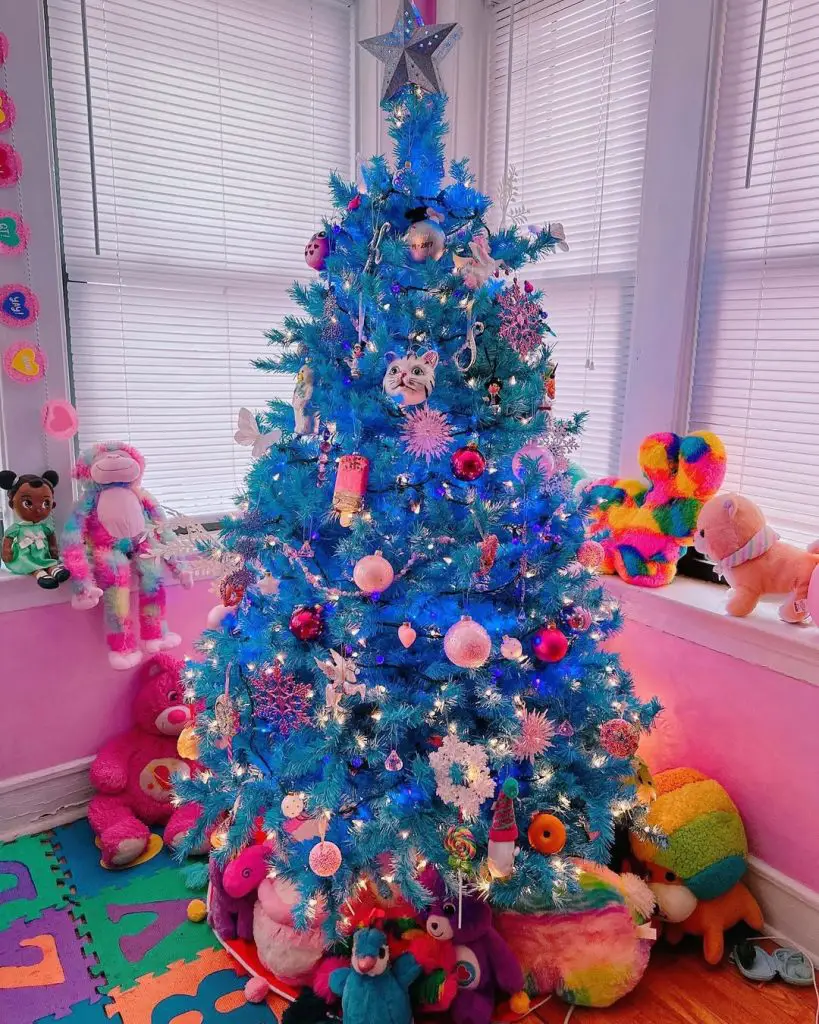 Turquoise Christmas tree in colorful children's playroom