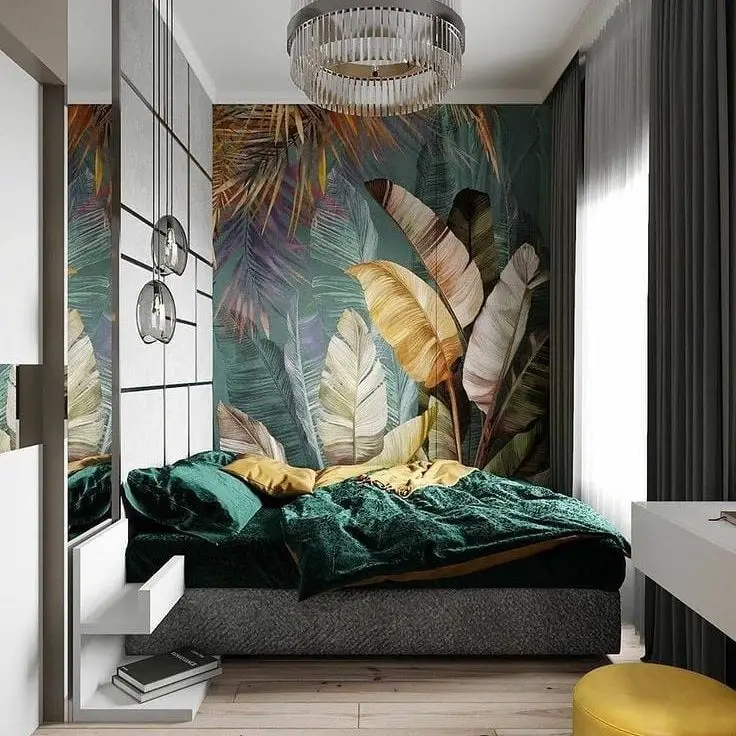 Small bedroom with tropical wallpaper and emerald bedding