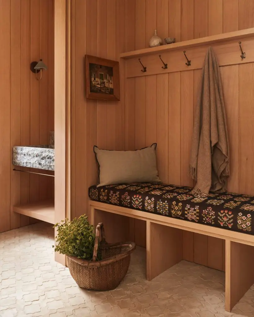 Cedar wood mudroom with geometric bench cushion and hooks