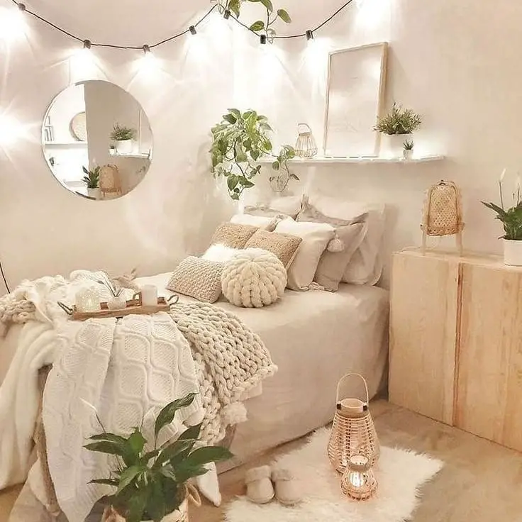Bohemian bedroom with round mirrors and string lights