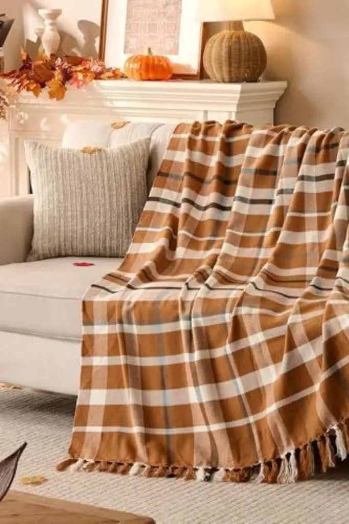 Plaid throws add rustic seasonal comfort.