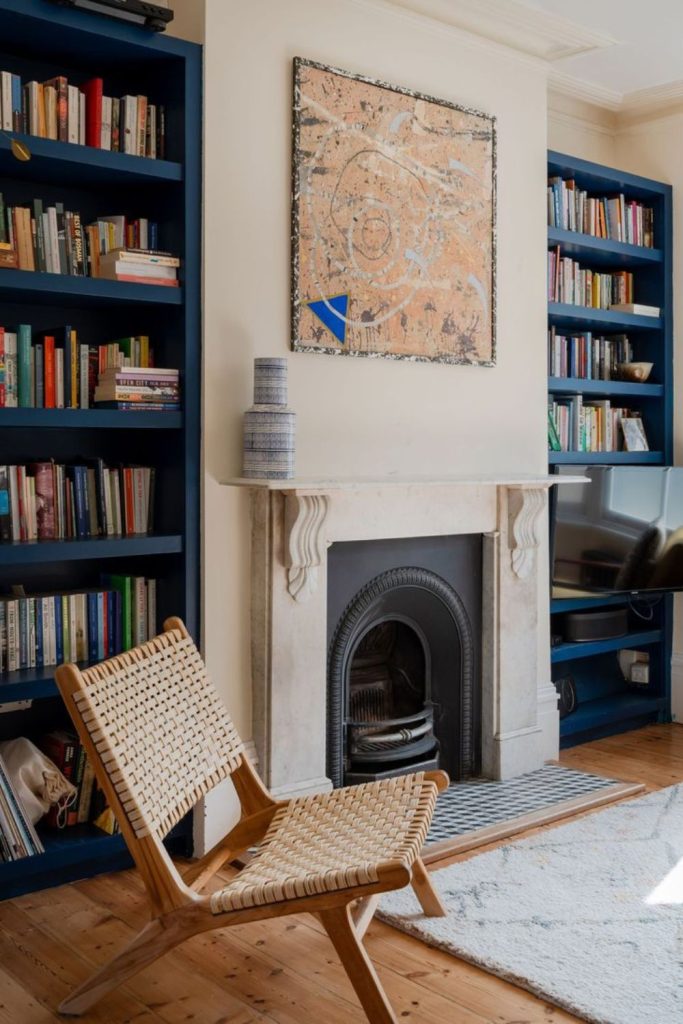 Floor shelves with wool blankets.