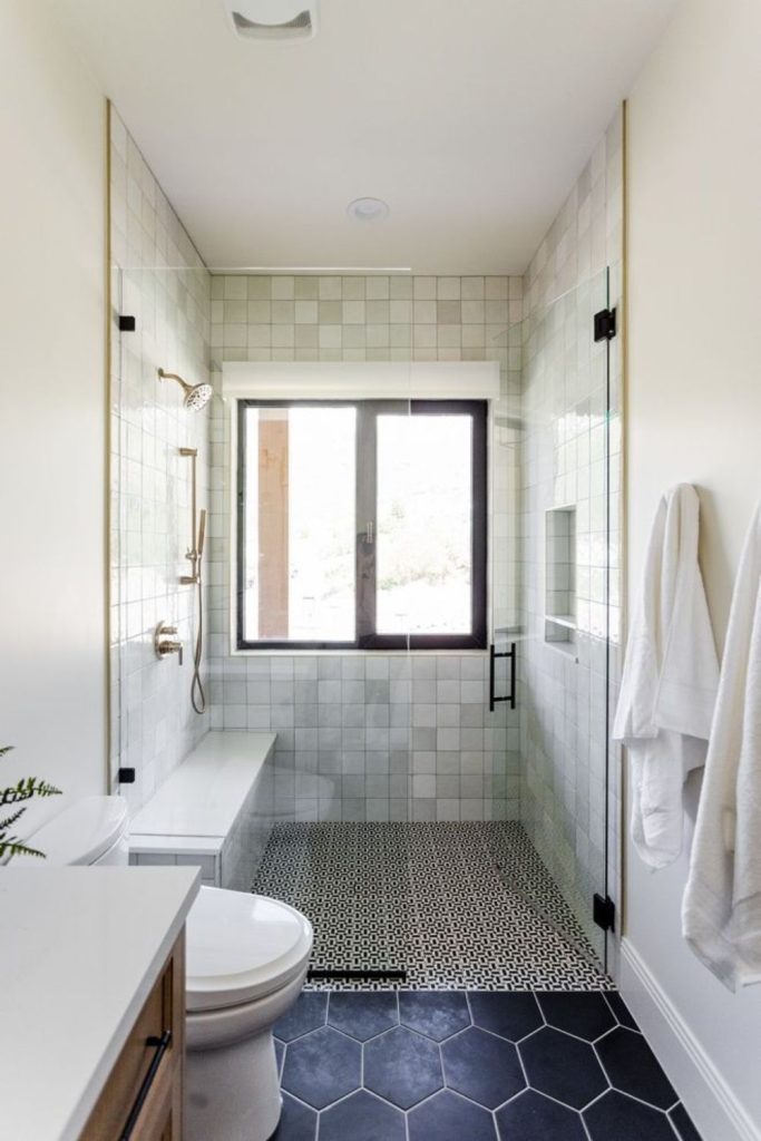 Curbless shower floor creates seamless look.