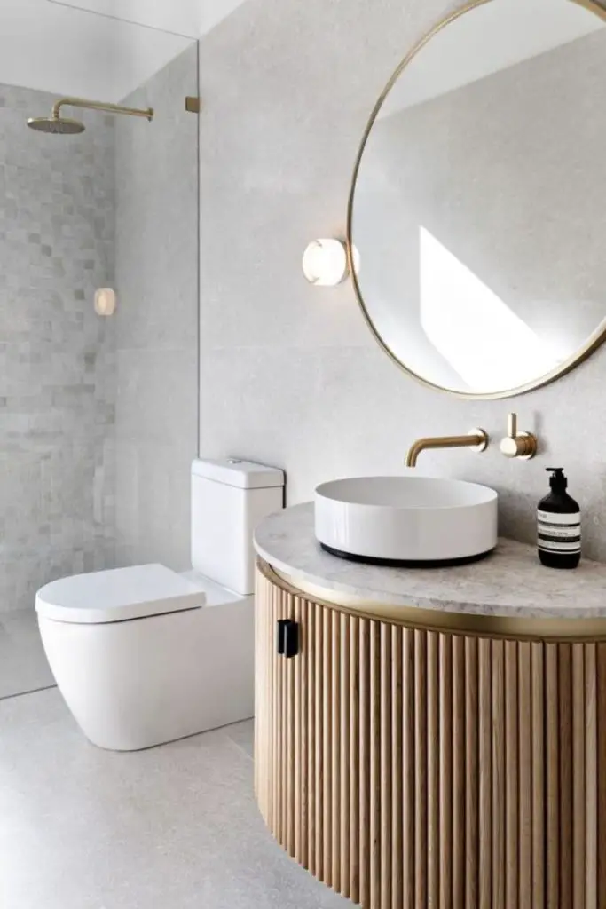 Rounded bathroom edges soften narrow design