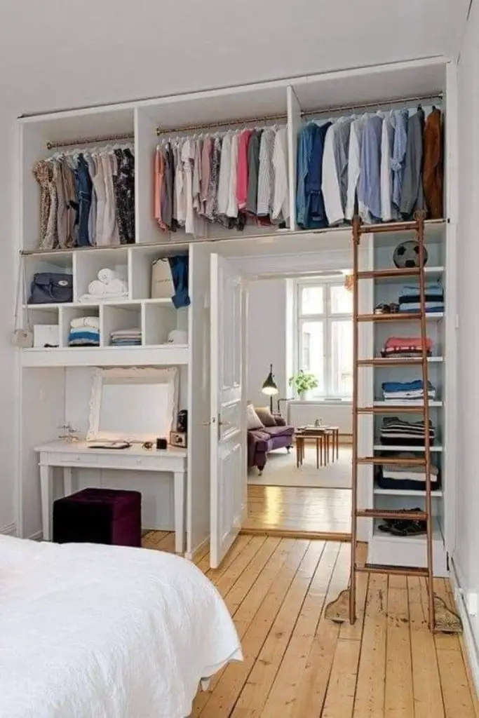 Elevated shelves above doorway for storage.