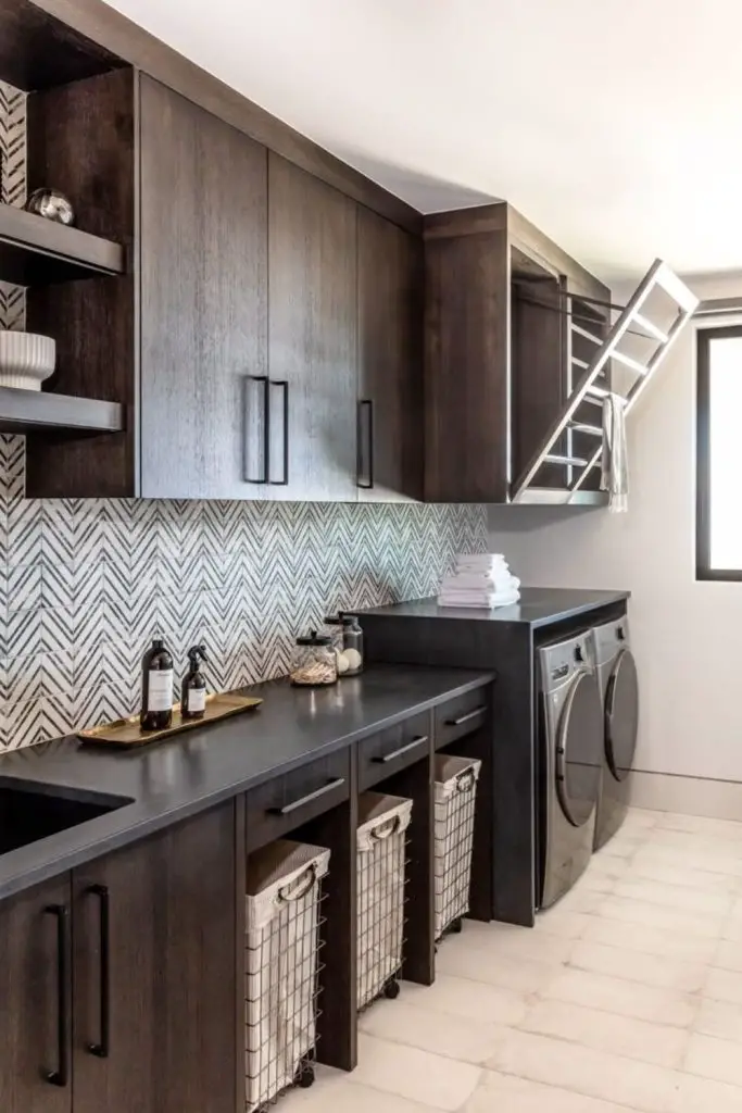 Graphite panel walls bold laundry design