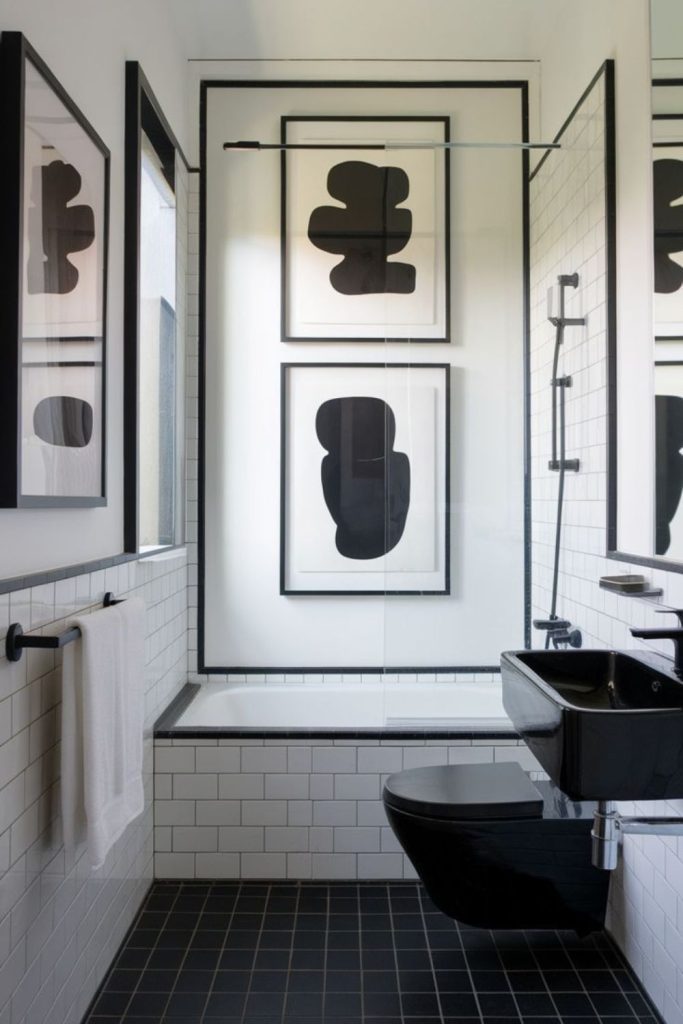 Minimal black bathroom with bold elegance.