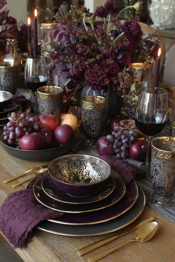 Moody plum layered fall dining theme