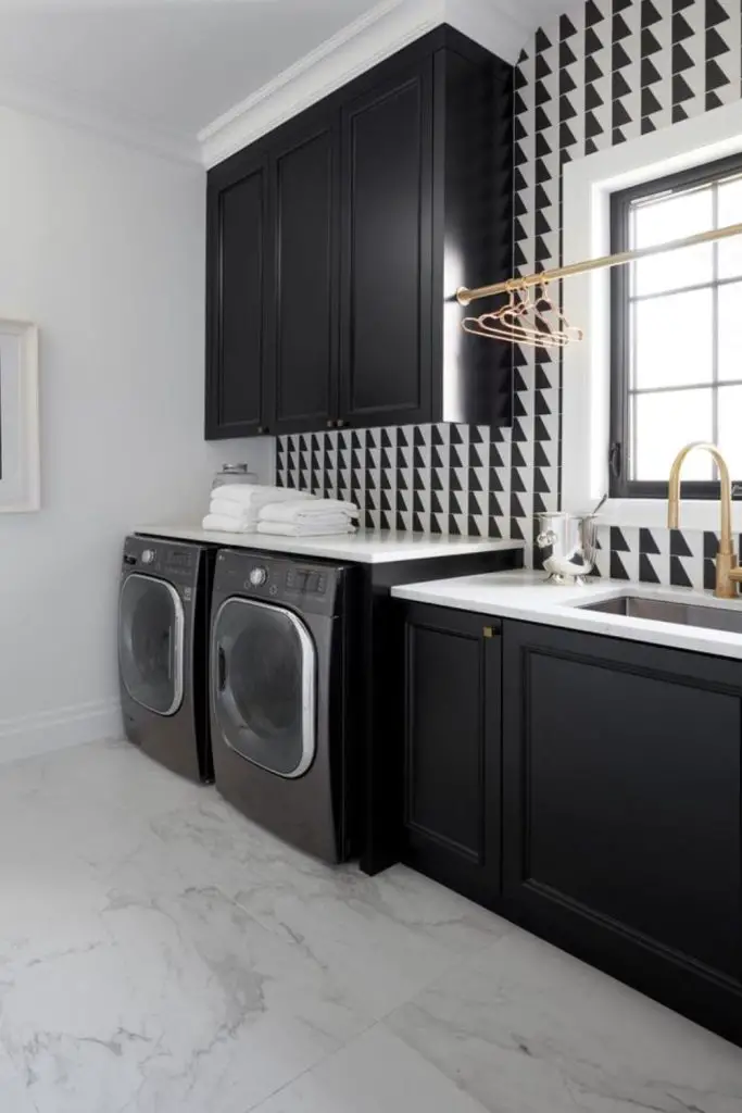 Sleek slate tiles modern laundry setup