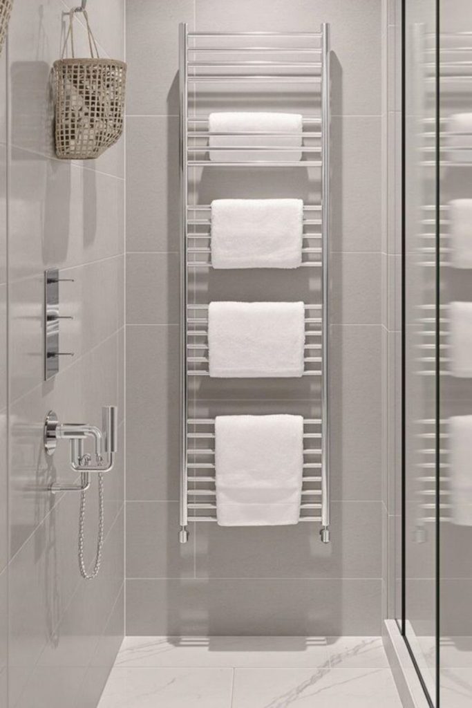 Heated towel rail adds cozy comfort.