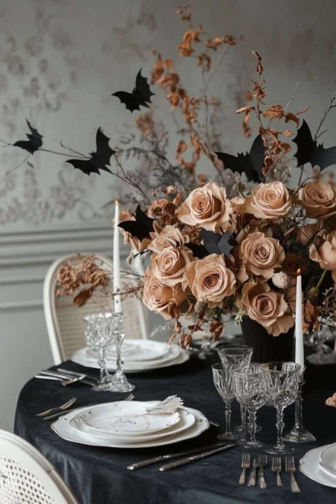 Bat wing centerpiece with silver plates.