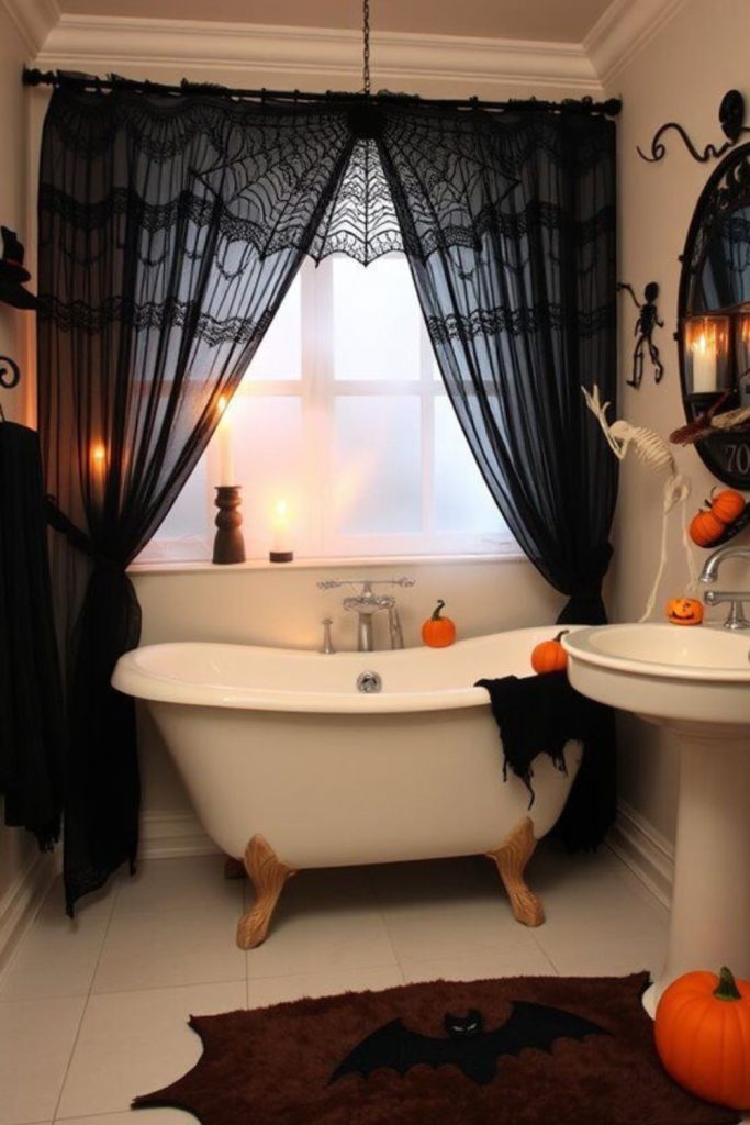 Black lace curtain and bat-themed Halloween bathroom decor.