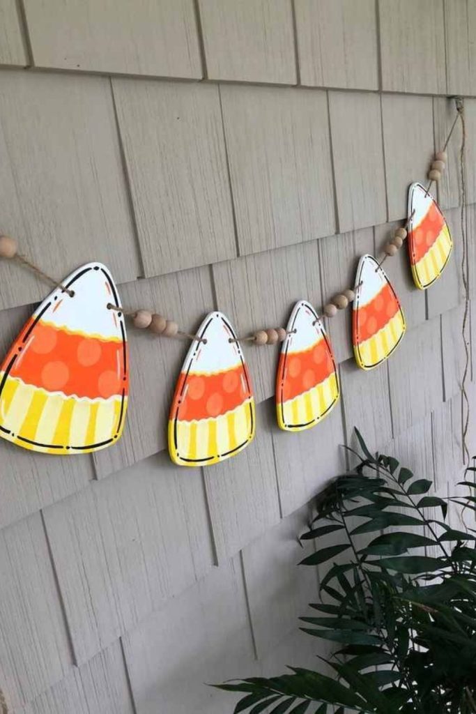 Candy corn paper garland hanging decor.