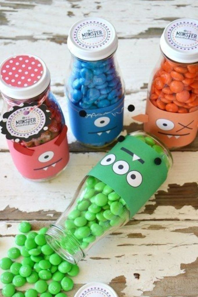 Candy monster jars filled with treats.