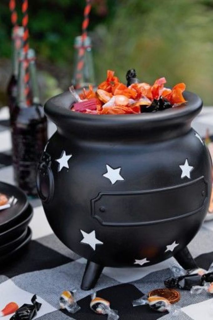 Candy-filled cauldron bubbling with smoke and candy.