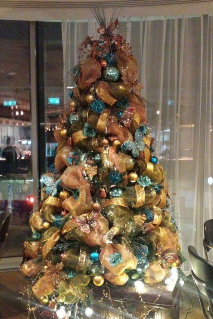 Copper and teal elegant holiday setup.