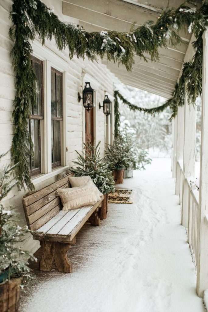 Magical snowy lantern-lit winter porch.