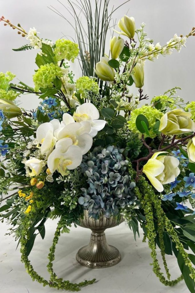 Green orchid and cedar calming arrangement