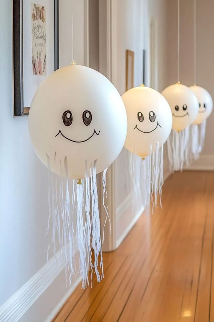 Floating ghost balloons with glow sticks.