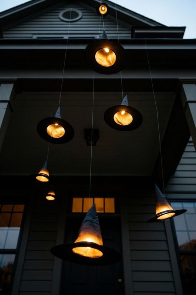 Floating witch hats glowing with lights