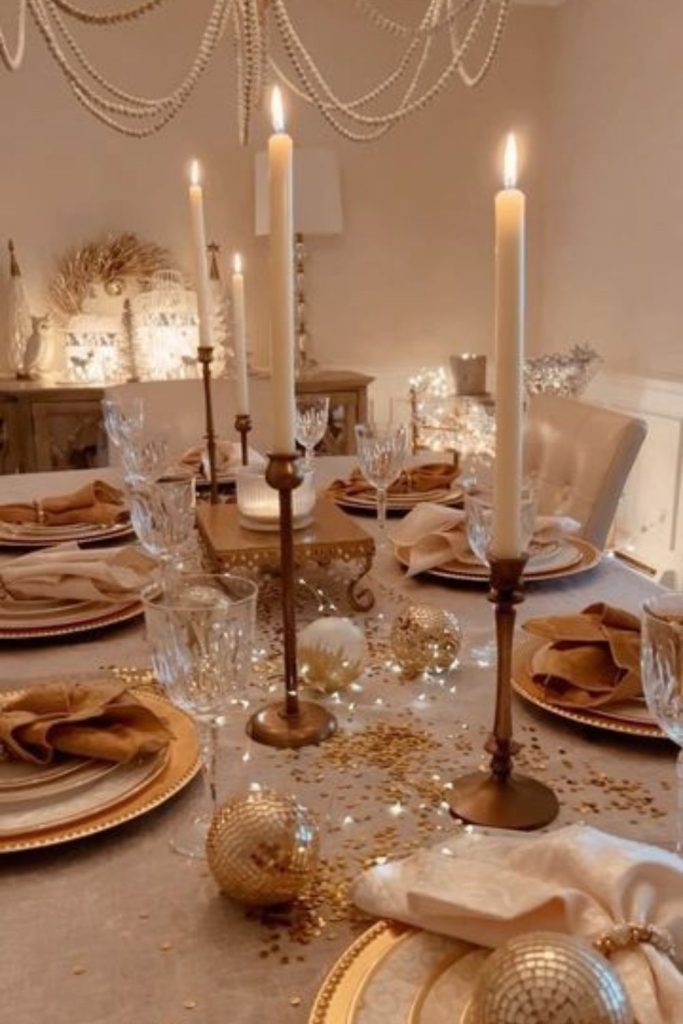 Golden evergreen winter holiday tablescape.
