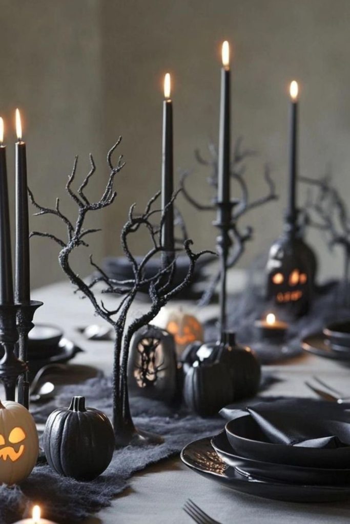 Graveyard moss table with white pumpkins.