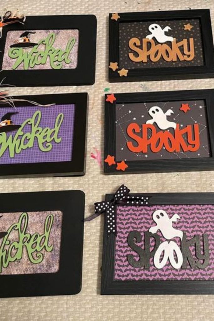 Haunted mirror frames with spooky decor.