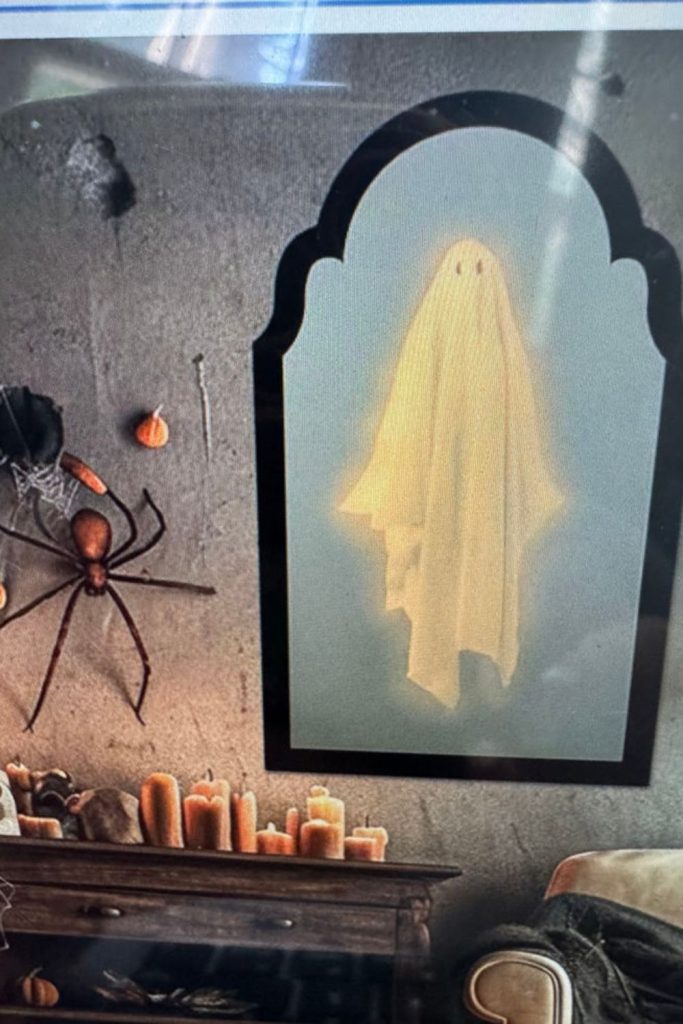Haunted mirror illusion reflecting ghostly shape