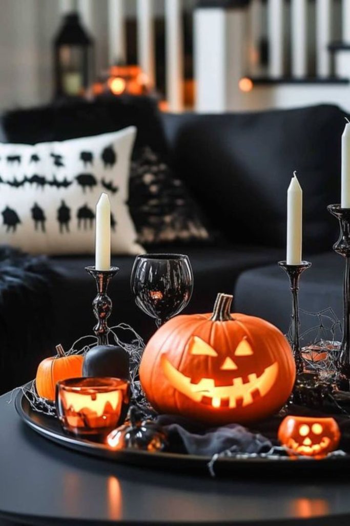 Haunted mirror tray reflecting candlelight.