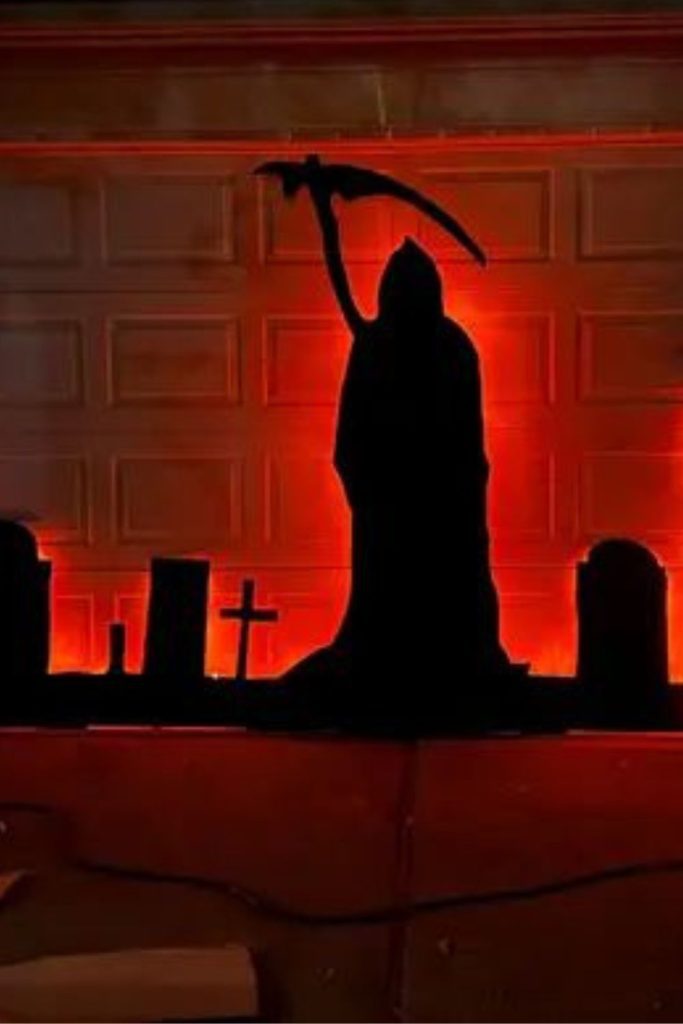 Haunted window silhouettes with red glow