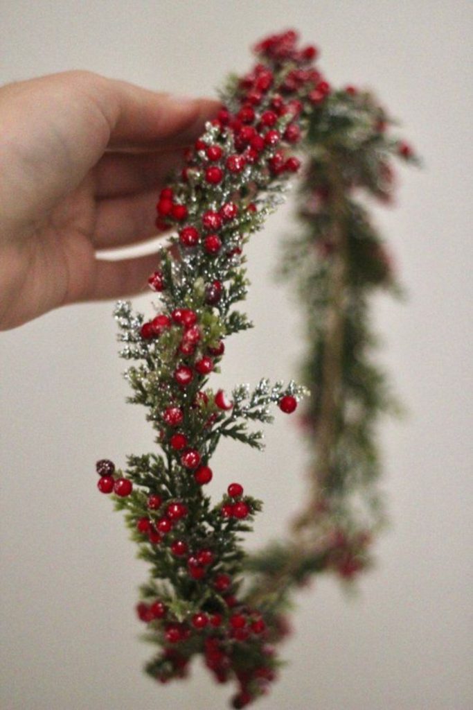 Holly berries with white rose centerpiece