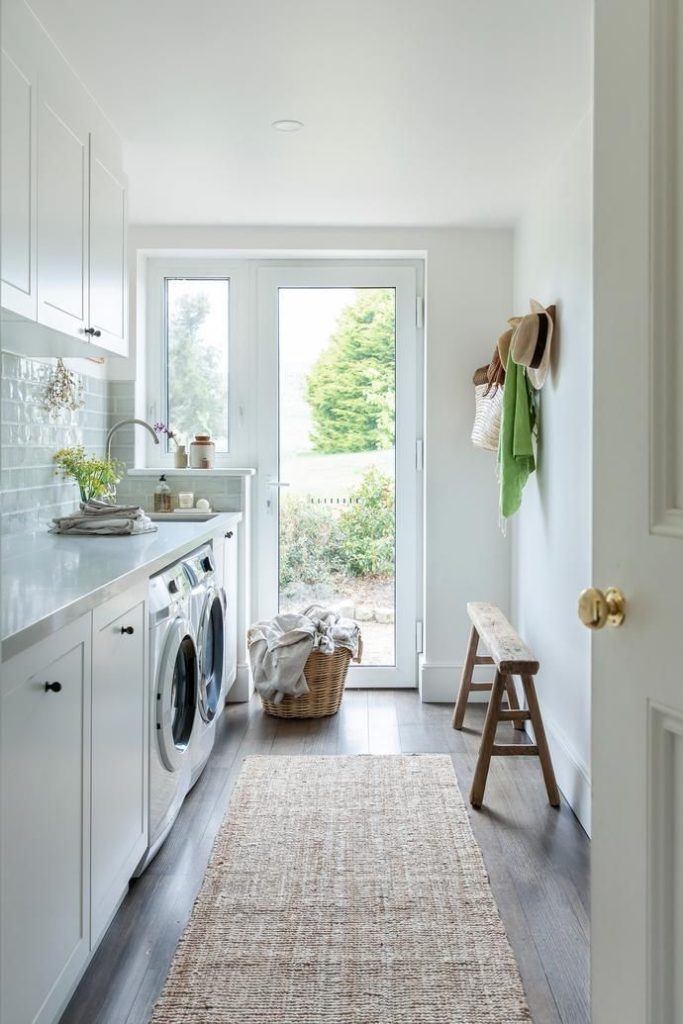 Warm honey toned utility laundry nook.