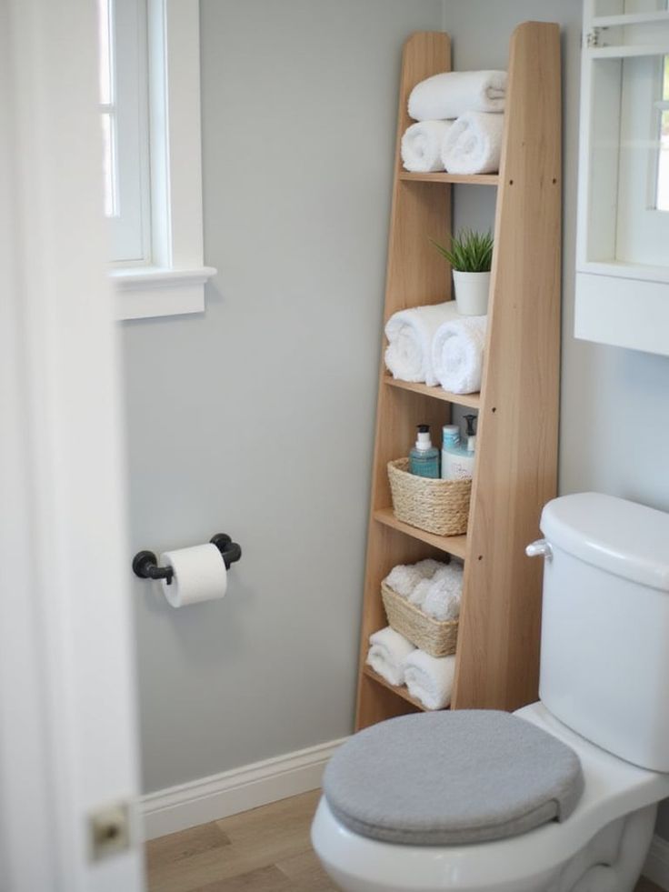 Wooden ladder shelf for small bathrooms.