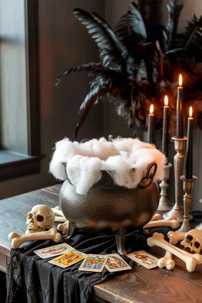 Moonlit cauldron centerpiece with violet blooms.