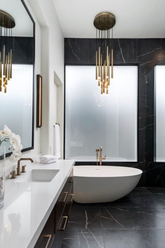 Luxurious black marble and white vanity.