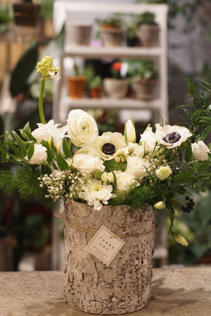 Rosehip and ranunculus frosted meadow bouquet