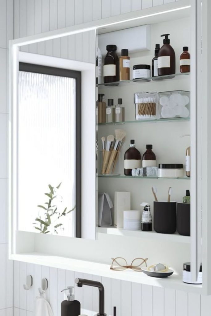 Sliding door mirrored cabinet design.
