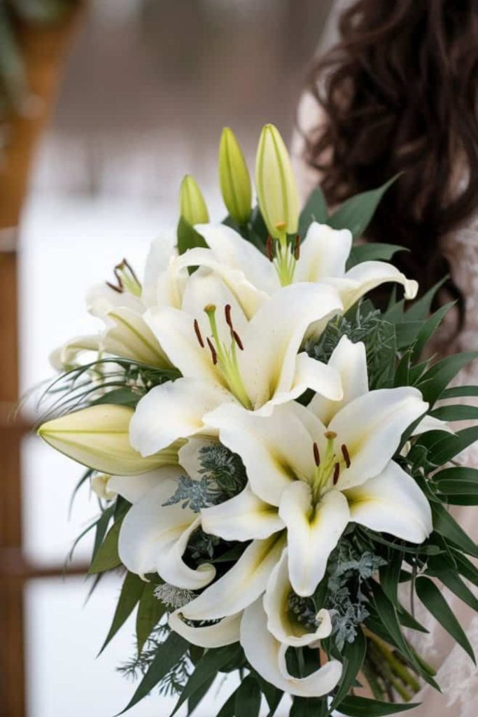 White lily frosted holiday table piece