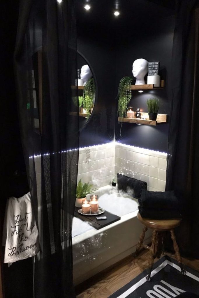 Witch-inspired washroom with cauldrons and lace.