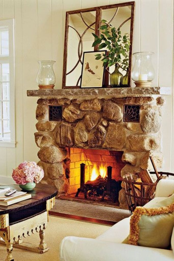 Willowbeam hearthroom with sandstone fireplace.