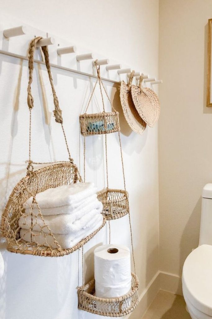 Woven hanging hammock towel storage.