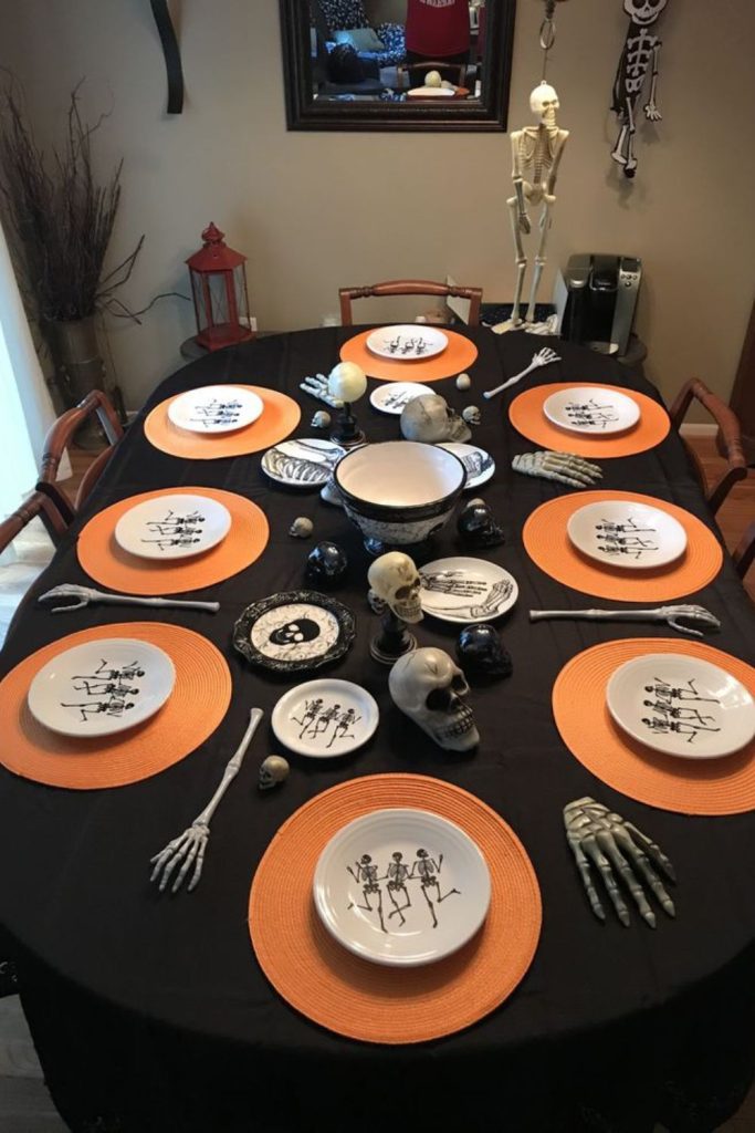 Zombie hand utensil holders gripping cutlery.