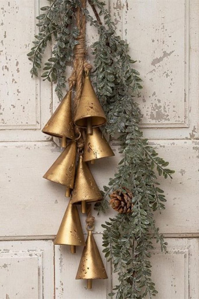 Antique brass bells holiday console décor.