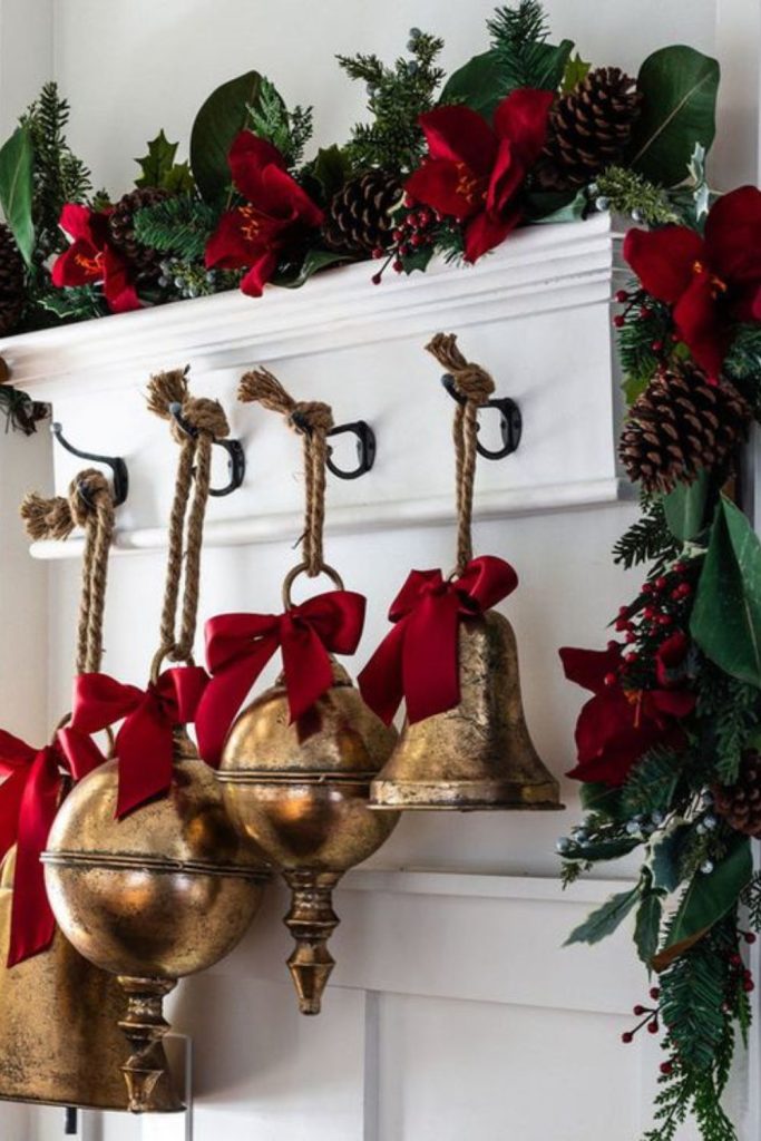 Brass bell entry with cedar wreath.