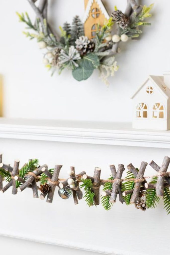 Rustic driftwood garland with pinecones