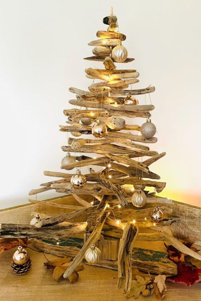 Driftwood tree sculpture with pine