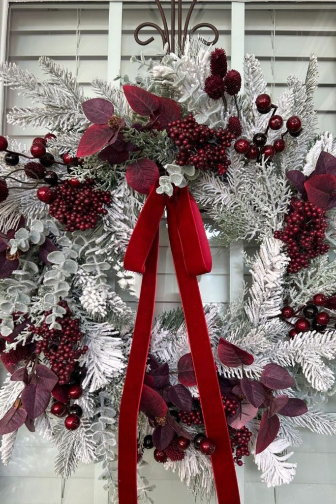 Frosted orchard berry winter wreath doorway